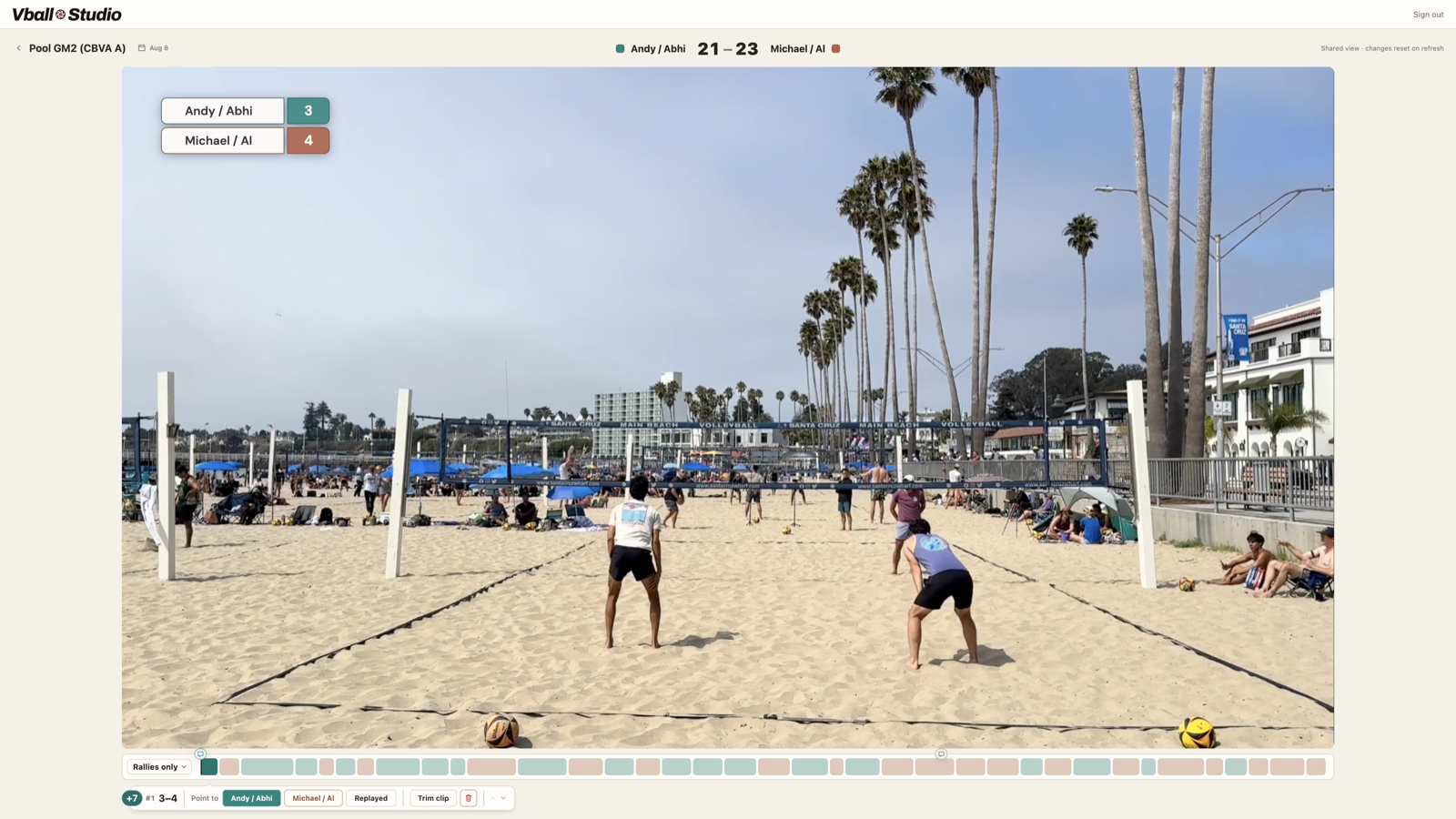 Vball Studio shared match view with score overlay, rally timeline, and court footage